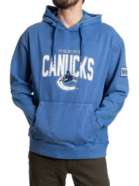Load image into Gallery viewer, Vancouver Canucks Distressed Logo Unisex Blue Acid Wash Hoodie
