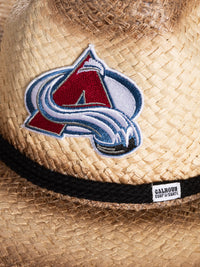 Load image into Gallery viewer, A close up of the front of the Colorado Avalanche straw cowboy hat. Visible is the team logo, the black rope surrounding the crown of the hat, and the Calhoun Surf &amp; Skate logo.
