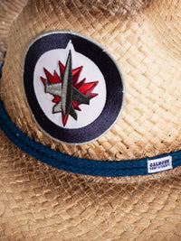 Load image into Gallery viewer, A close up of the front of the Winnipeg Jets straw cowboy hat. Visible is the team logo, the navy rope surrounding the crown of the hat, and the Calhoun Surf &amp; Skate logo.
