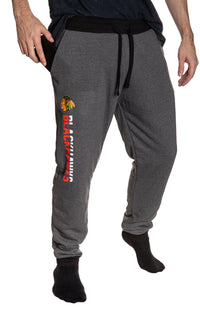Load image into Gallery viewer, Chicago Blackhawks NHL Unisex Sherpa Lined Warm Sweatpants with Pockets

